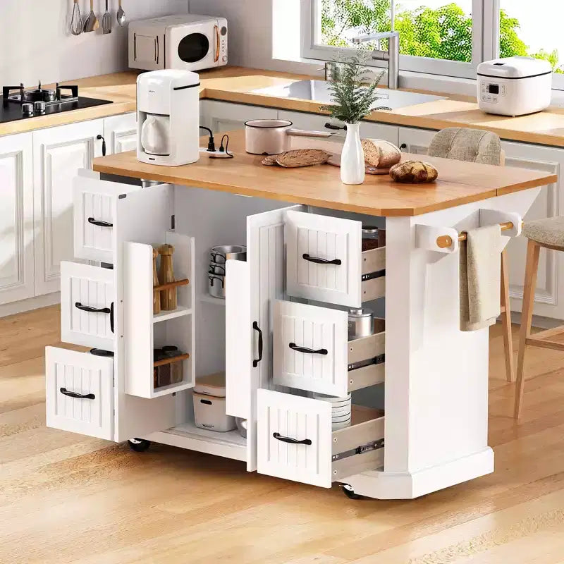 Isola da Cucina Bianca 56" Impiallacciatura in Legno di Gomma, Ribaltina, Presa di Corrente, 4 Ante, Ripiani, 6 Cassetti Profondi, Carrello Rotante